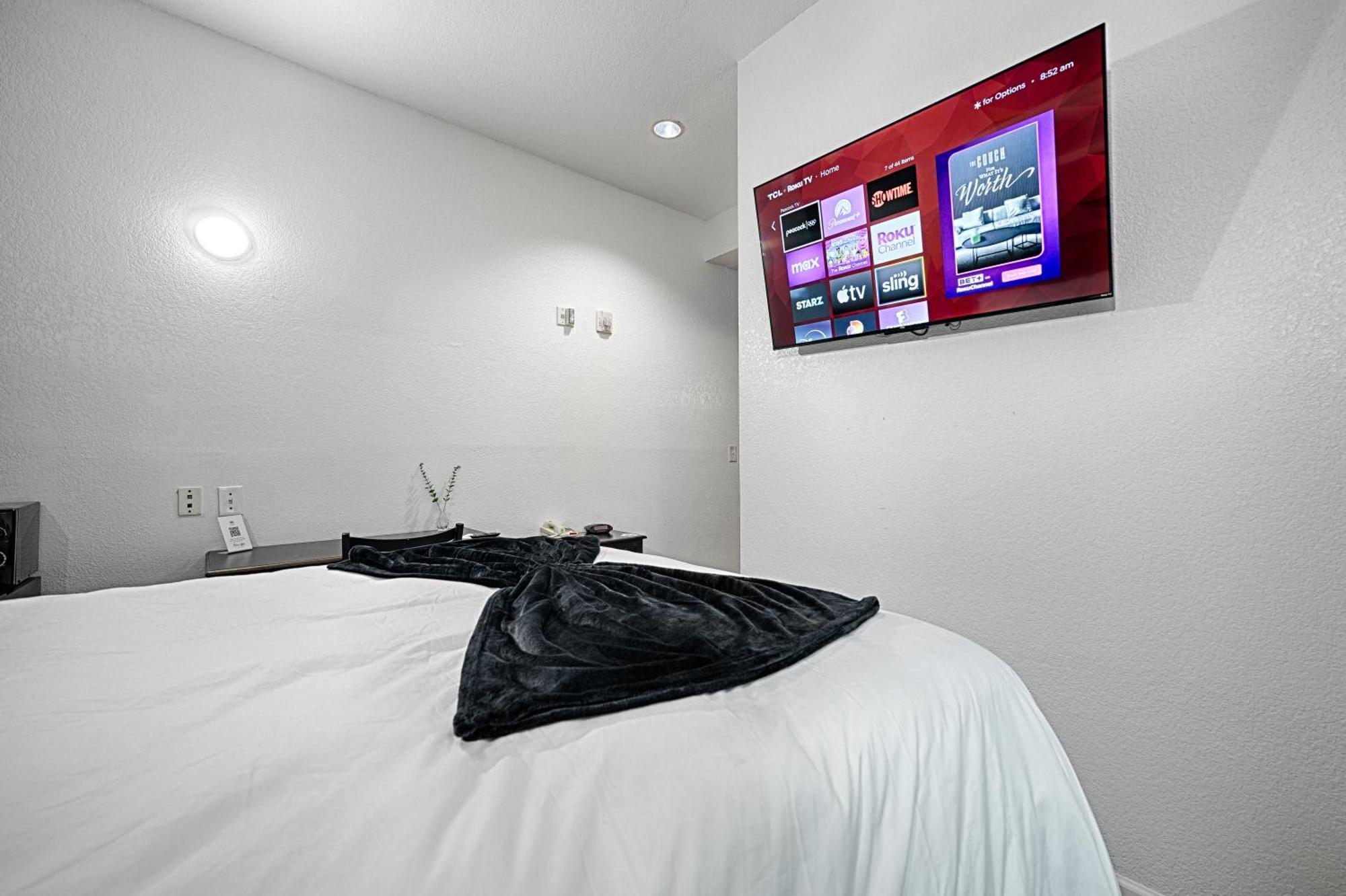 Hotel Dilley Grand Quarto foto