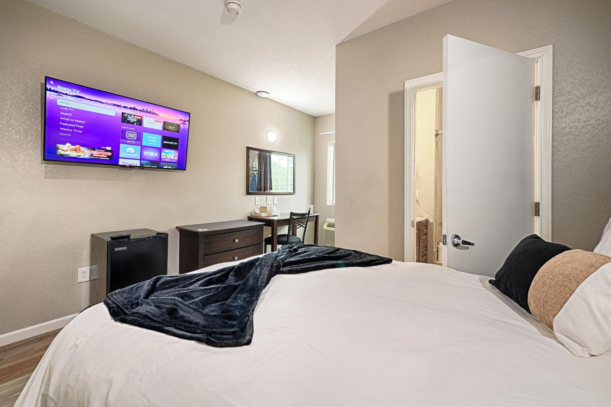 Hotel Dilley Grand Quarto foto